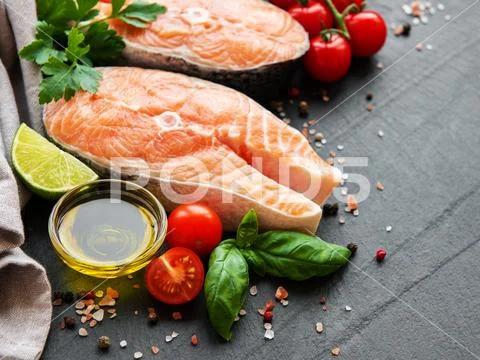 Raw salmon steaks Stock Photos