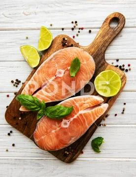 Raw salmon steaks Stock Photos
