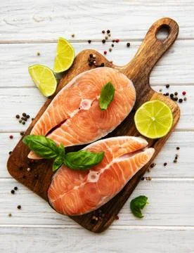 Raw salmon steaks Stock Photos