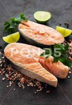 Raw salmon steaks Stock Photos