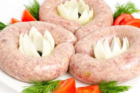Raw sausages Stock Photos