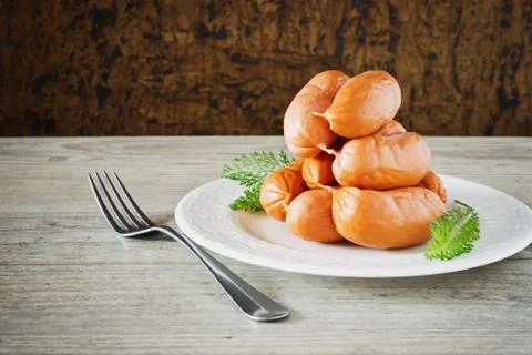 Raw sausages Stock Photos