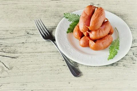 Raw sausages Stock Photos