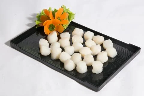 Raw scallops ready for cooking. Stock Photos