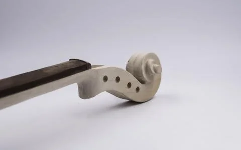 Raw Scroll of Violin put on white background, Foto stock