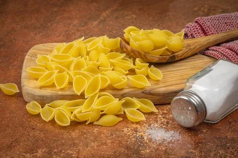 Raw "shellfish" pasta, close-up, on a table Stock Photos