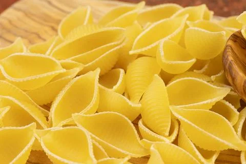 Raw "shellfish" pasta, close-up, on a table Stock Photos