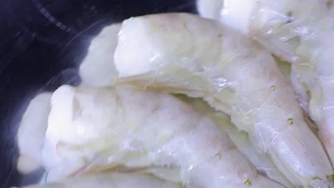 Raw shrimp before cooking Stock Footage 82699543