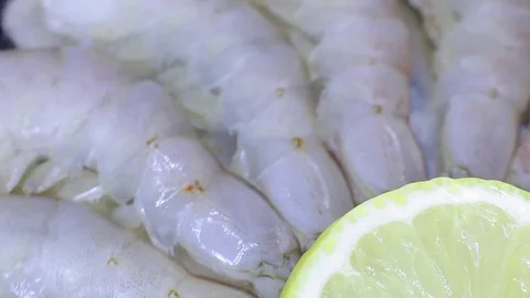 Raw shrimp with lemon Stock Footage 82701361
