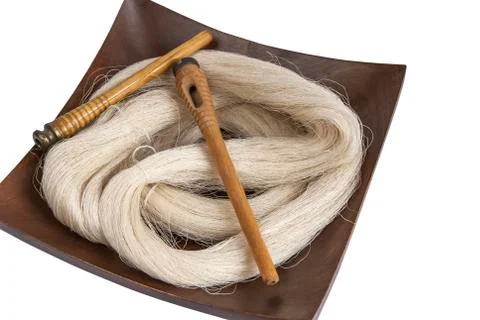 Raw silk yarn and spools Stock Photos