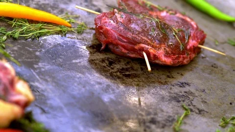Raw skewered beef steak and T-bones Stock-Footage 115078693