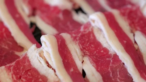 Raw Sliced Beef Prepared for Thai BBQ Hot Pot Stock Footage 344399321