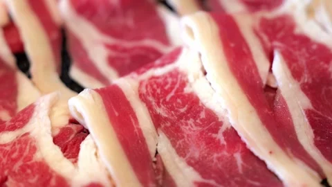 Raw Sliced Beef Prepared for Thai BBQ Hot Pot Stock Footage 344399443