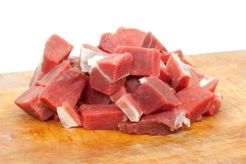 Raw sliced meat on a board Stock Photos