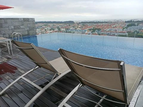 Raw Small Infinity Pool Overlooking Neighborhood Stock Photos
