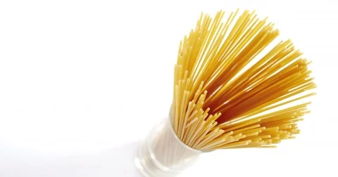 Raw spaghetti in arranged in container Stock Footage