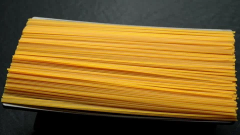 Raw Spaghetti Bundle Rotating Close-Up Stock Footage 345599037