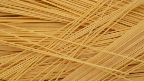 Raw spaghetti, dolly shot. Pasta - background. Stock Footage 148975403