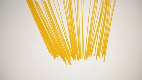 Raw spaghetti on white background. 8 Stock Footage 98154540