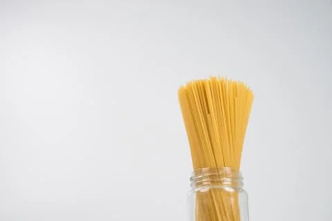 Raw spaghetti on white background. Foto stock