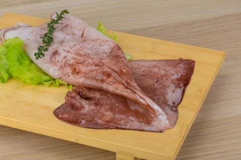 Raw squids Stock Photos