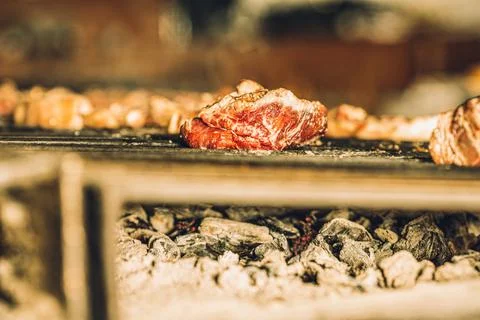 Raw Steak in the Grill Stock Photos