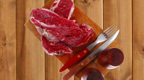 Raw steak ready to prepare Vídeos de archivo 24406181