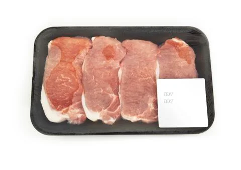 Raw steaks in the packageisolated on white background Stock Photos