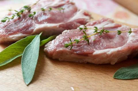 Raw steaks Stock Photos
