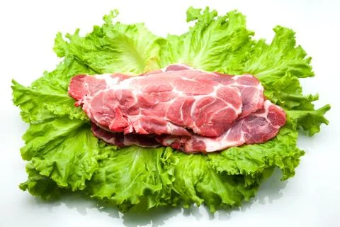Raw steaks Stock Photos