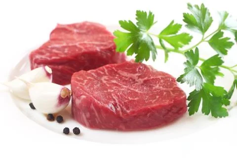 Raw Steaks Stock Photos