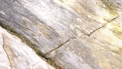 Raw stone texture. Sun glare on a stone wall. Stock Footage 157501137