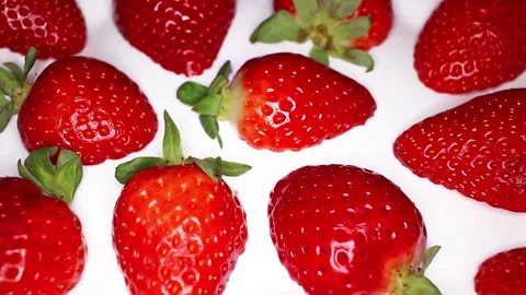 Raw Strawberry fruit Texture Closeup Video Seamless Looping Stock Footage 140135635