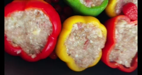 Raw Stuffed Bell Peppers with Minced Meat in Baking Dish . Video stock 329692491