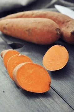 Raw sweet potatoes Stock Photos