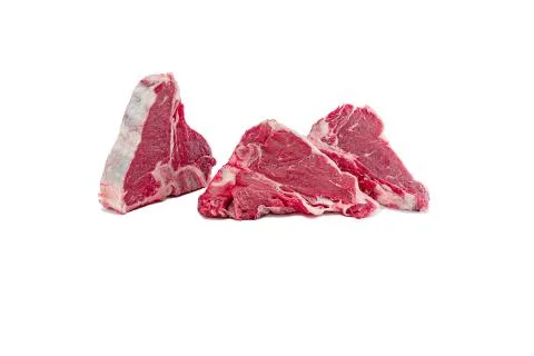 Raw T-bone steak on the white background. Foto stock