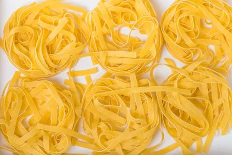 Raw tagliatelle in a box Stock Photos