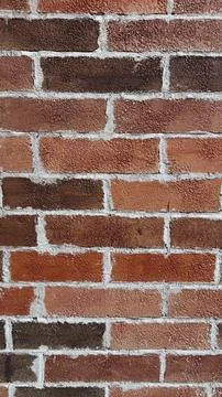 Raw textured surface of brick wall evokes an industrial and urban vibe, perfect Stock Photos