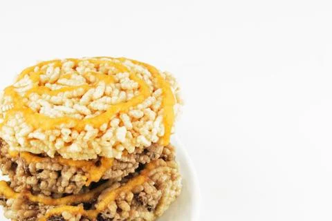 Raw thai ancient dessert made from streamed sticky rice pressed in circle mol Stock Photos