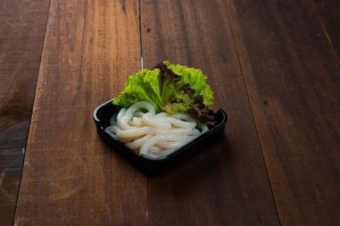 Raw thick white noodle Stock Photos