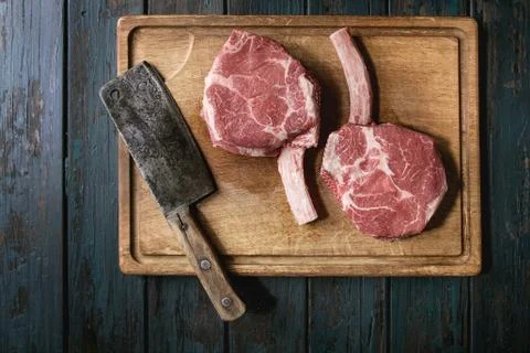 Raw tomahawk steak Stock Photos