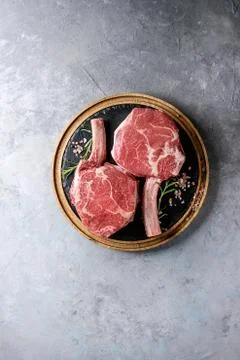 Raw tomahawk steak Stock Photos