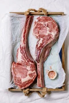 Raw tomahawk steak Stock Photos