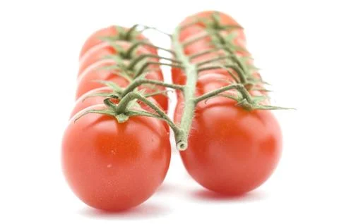 Raw tomato on white background Stock Photos