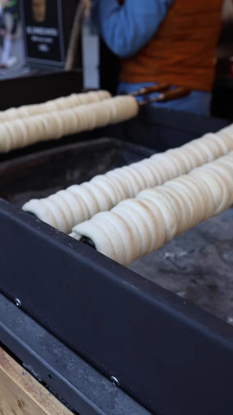 Raw trdelnik dough on grill Video stock 331811987