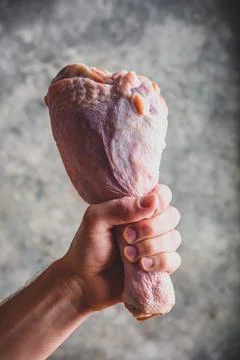 Raw turkey leg Stock Photos