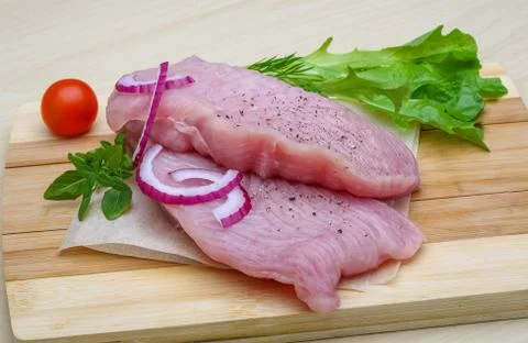 Raw turkey steak Stock Photos