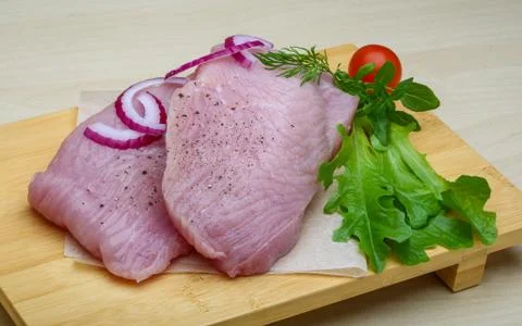 Raw turkey steak Stock Photos