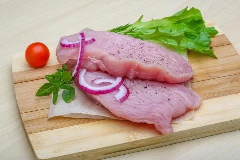 Raw turkey steak Stock Photos