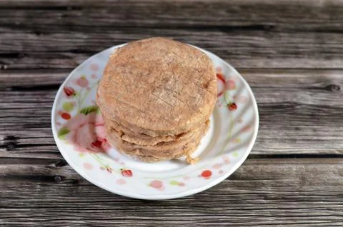 Raw uncooked beef burger ready to be cooked and fried in shallow oil, Fast .. Stock Photos